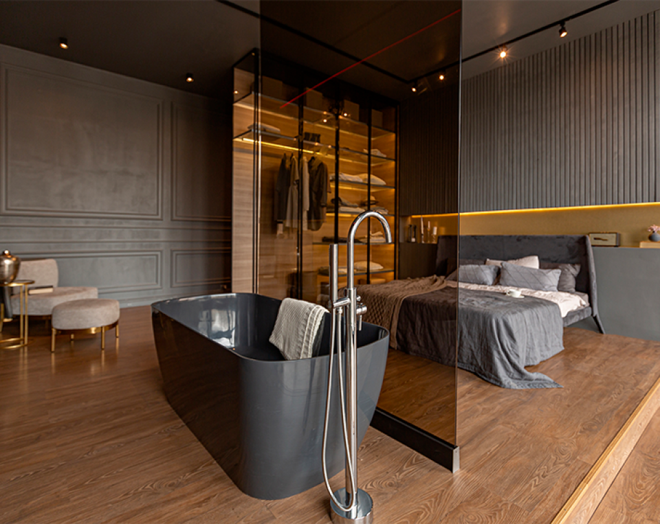 Une chambre parentale avec dressing et salle d’eau